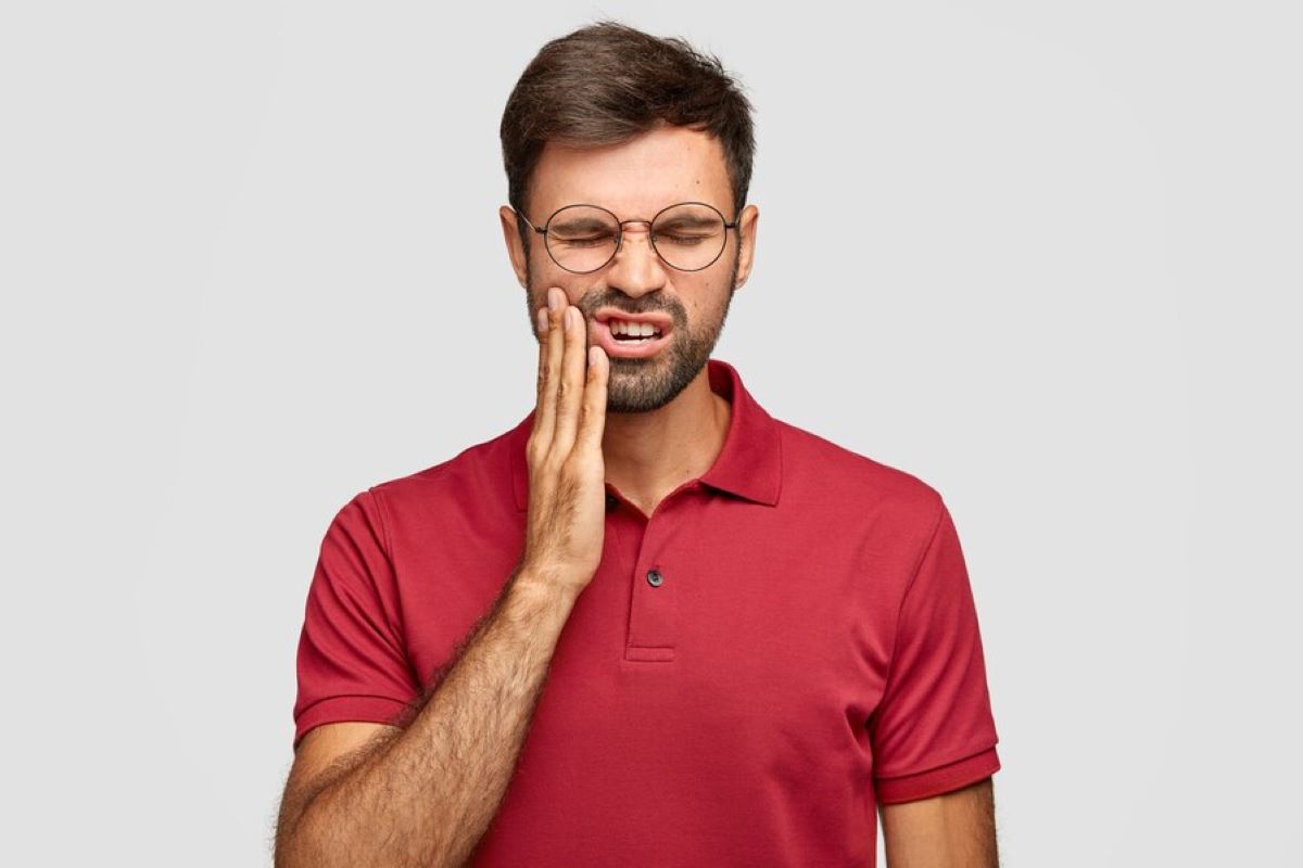 Inflammation de dent dévitalisée Comment la traiter